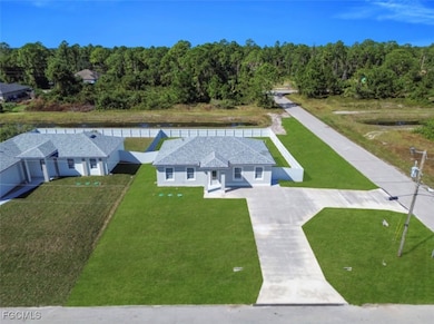 946 Hansen St E, Lehigh Acres, FL 33974 - photo 2