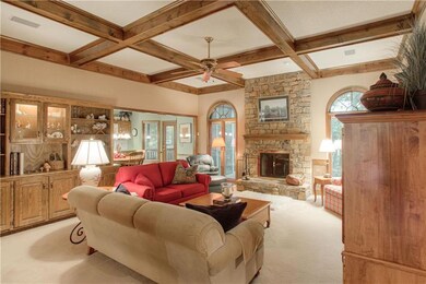The prettiest great room overlooking the treed bac