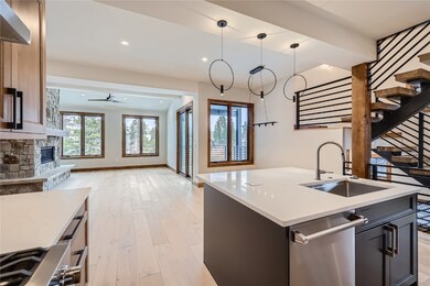 Kitchen and great room with covered deck.