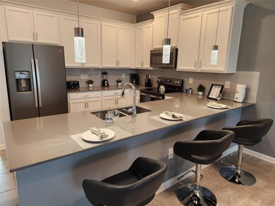 8885 Cabot Cliffs Dr unit 104, Davenport, FL 33896 - photo 4