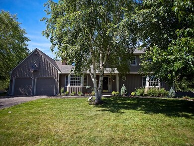 Charming colonial with large flat driveway.