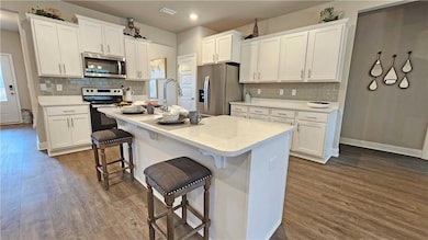 Photos of a previously built home and are representational only. Colors and finishes may vary.