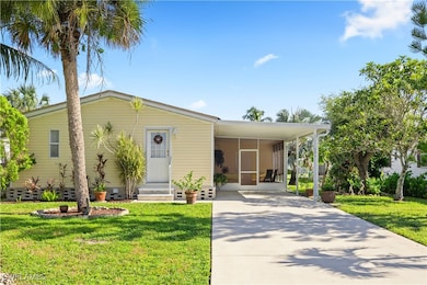 Manufactured / mobile home with concrete driveway,