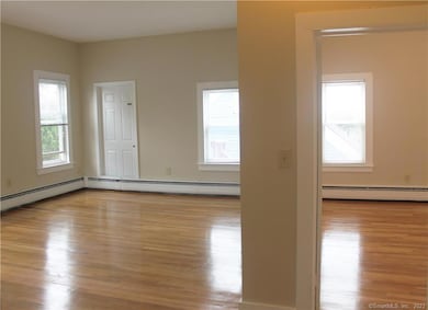 View of Living Room (on left) and separate Bedroom