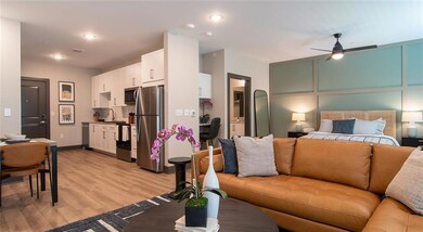 Living room featuring light hardwood / wood-style 