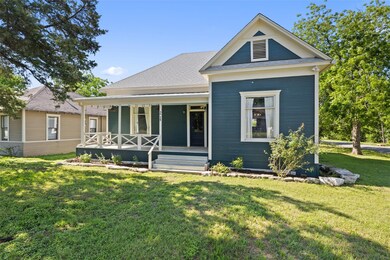 View of front of property featuring a porch and a
