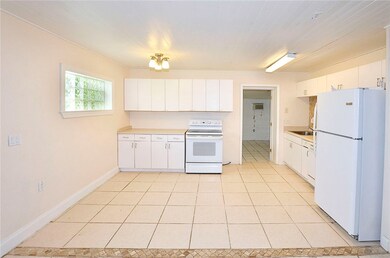 Kitchen with doorway to bedroom or family room