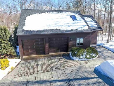 A Total of 4 Garage Spaces, 2 Attached and 2 Detac