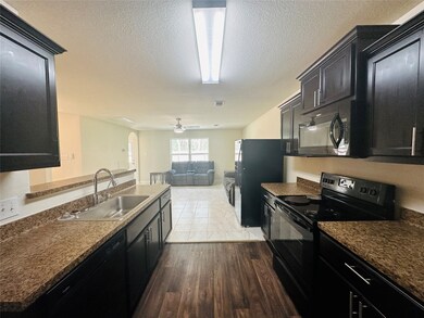 10558 Logger Pine Trail, Houston, TX 77088 - photo 5