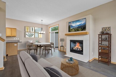 09_1_mls.Virtually staged open concept living and dining rooms