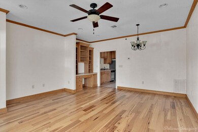 Unfurnished living room with light hardwood / wood