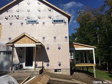 Exterior Front. Fully Screened Back Porch Also, be