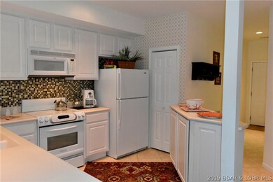 Walk in pantry offers great extra storage as does