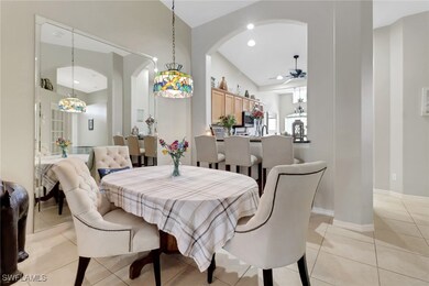 Warm colors on the walls and light colored tile fl