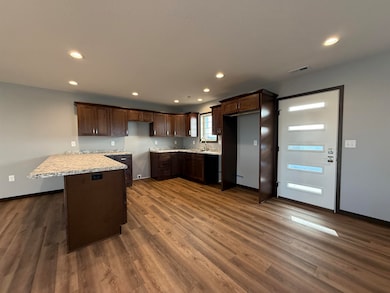 Kitchen with side door to patio