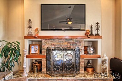 This home's beautiful stone-faced gas-log fireplac