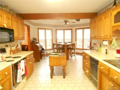 View from the formal dining room area into the kit