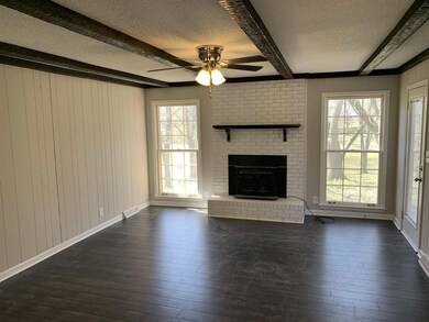 Your new Den area with a wood burning fireplace