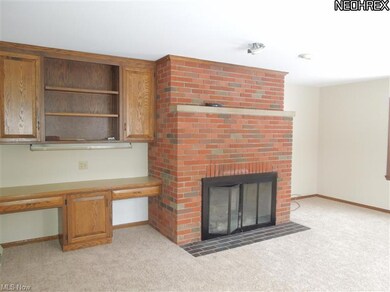 Family Room with woodburning fireplace