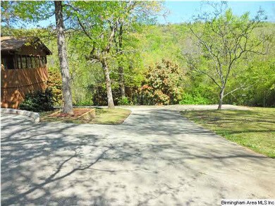 Tons of parking at this home! Down this drive lead