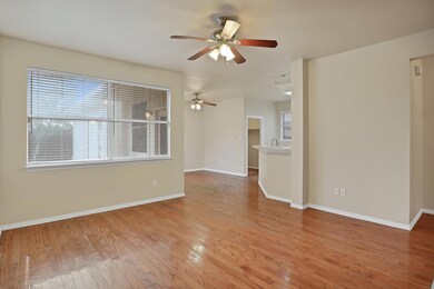 Living room featuring light hardwood / wood-style 