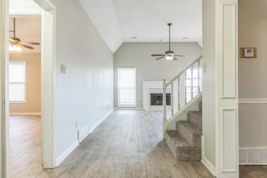 Unfurnished living room with plenty of natural lig