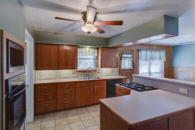 The spacious Kitchen offers an abundance of cabine