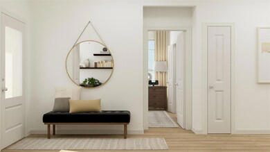 Hallway with light hardwood / wood-style flooring