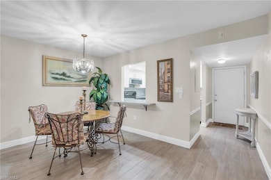 DINING AREA/UPDATED PLANK TILE FLOORING
