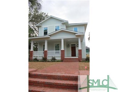 Exterior Front. Brick stairs and pavers on approac