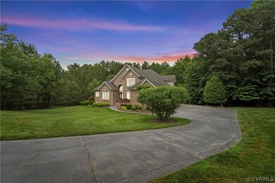 View of front facade with a lawn