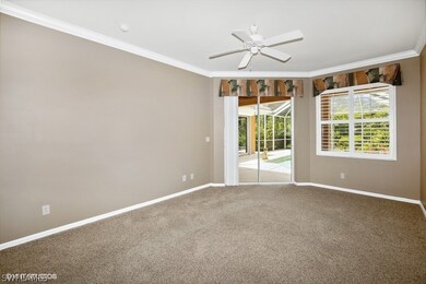 Master bedroom with slider to pool area