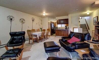 Living room view to dining/kitchen