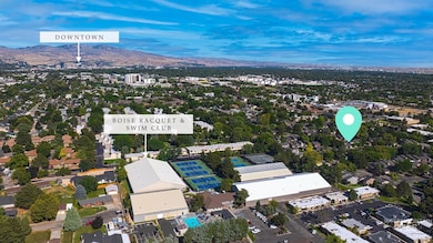 Aerial view of property's location with mountains