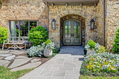 [Front Entrance]
Double arched glass-paned doors