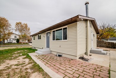 View of front of property featuring a patio area and entry steps