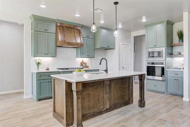 Designer kitchen with large island and coffee bar