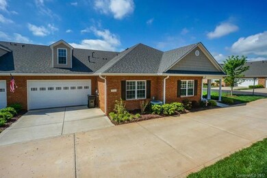 Side view with 2 car garage.