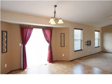 Elegantly Hung Lighting in the Dining Room.