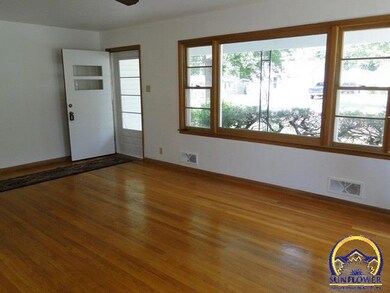 Original hardwood floors, Tons of windows offer bright, natural light