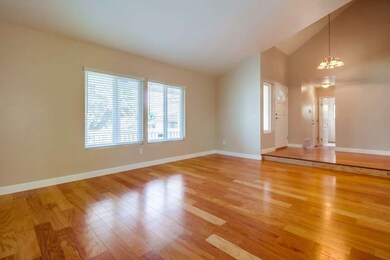 Living room is expansive and has a formal dining s