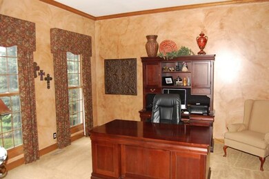 Oversized office/den with built in book shelves