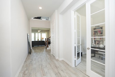 View as you enter the house, office with french do