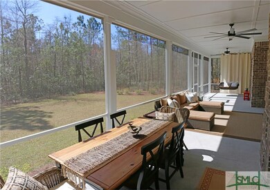Screened porch with wooded view
