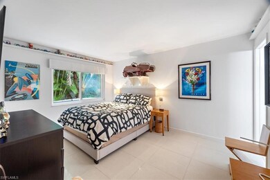 Bedroom featuring light tile patterned floors and 