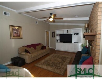 Living Room. Enjoy your cozy wood burning fireplac
