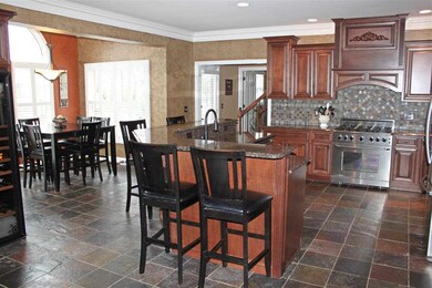 Flooring, upgraded stainless appliances including 