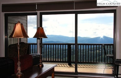 Multiple layers of mountains in a broad vista are