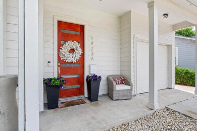 Property entrance with covered porch
