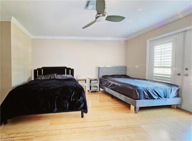 Master Bedroom featuring ceiling fan, ornamental m